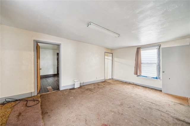 unfurnished room featuring wood-type flooring