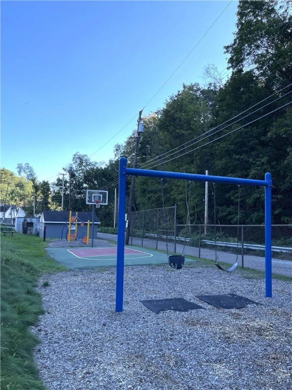 view of play area featuring basketball hoop