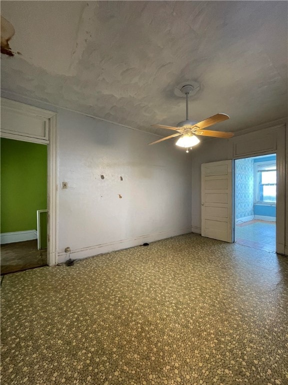 empty room with ceiling fan