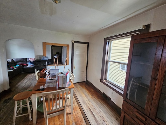 dining area featuring hardwood / wood-style floors