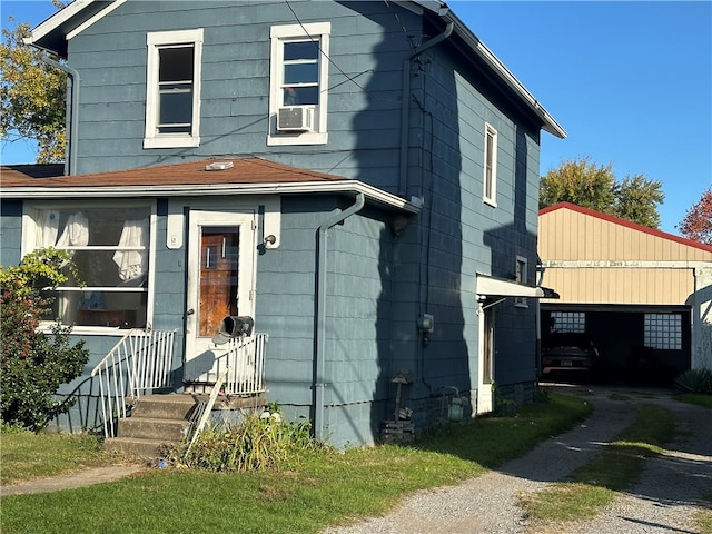 view of front of home featuring cooling unit