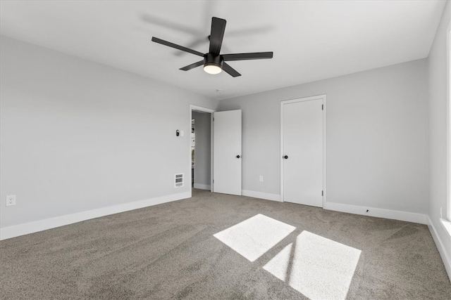 unfurnished bedroom with carpet flooring and ceiling fan