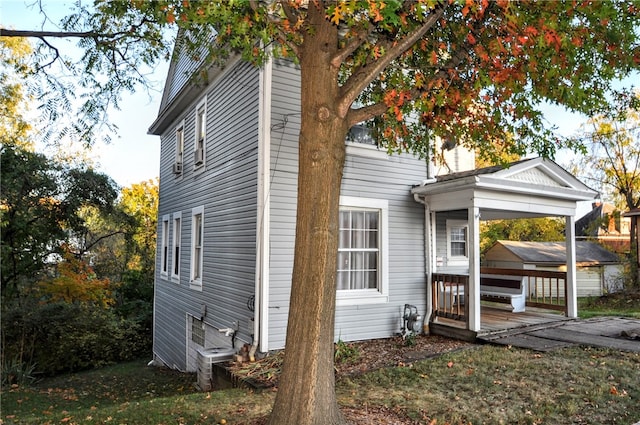 view of home's exterior featuring a gazebo and a deck