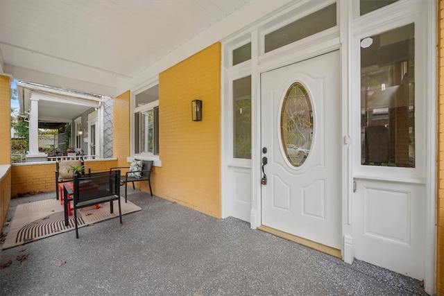 property entrance with a porch