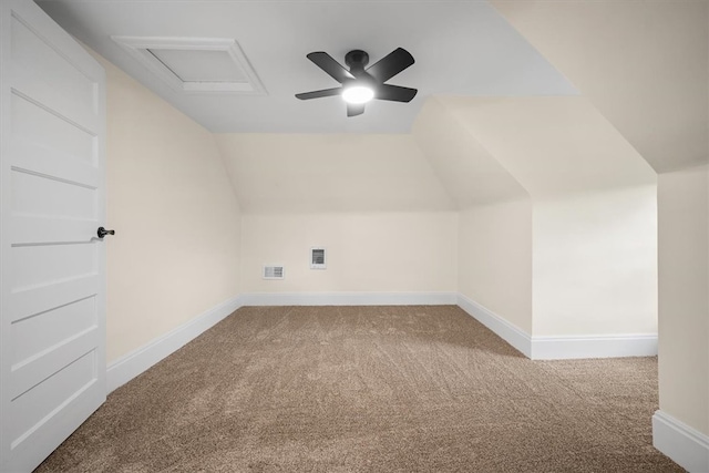 additional living space featuring ceiling fan, carpet, and vaulted ceiling