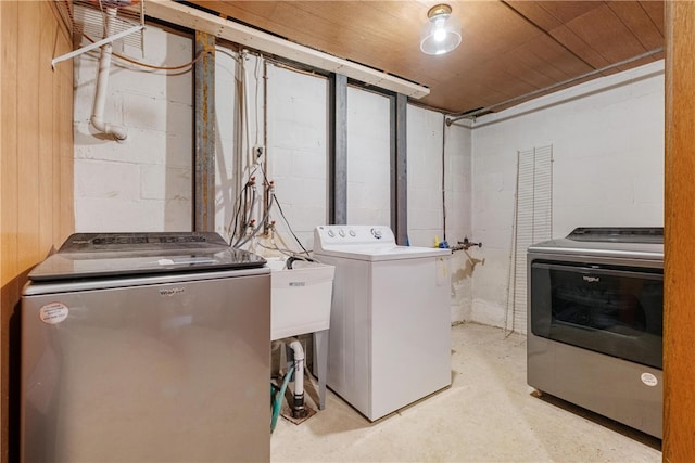 laundry room featuring independent washer and dryer