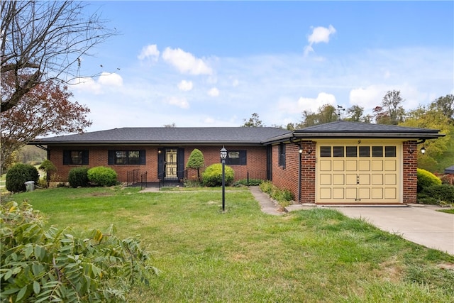 single story home featuring a front lawn and a garage