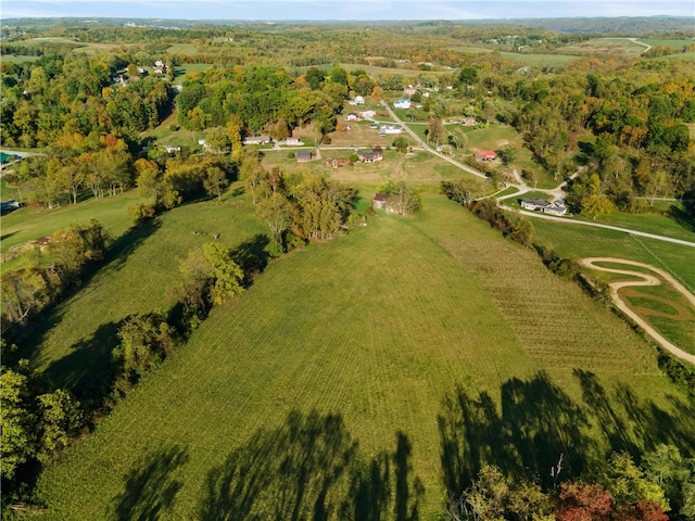 birds eye view of property featuring a rural view