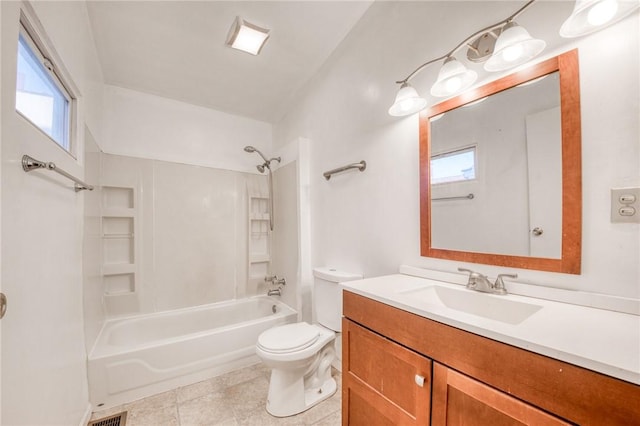 bathroom featuring bathing tub / shower combination, a wealth of natural light, toilet, and vanity