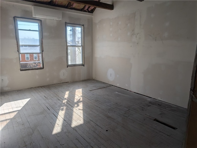 spare room featuring light hardwood / wood-style floors