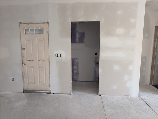 interior space with concrete flooring