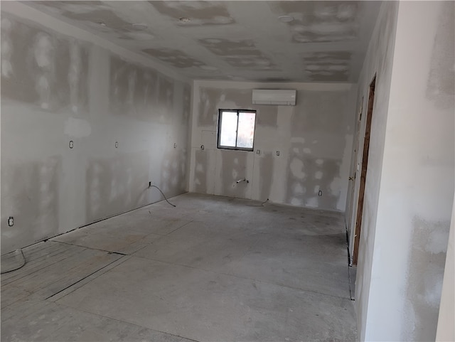 empty room featuring a wall mounted air conditioner