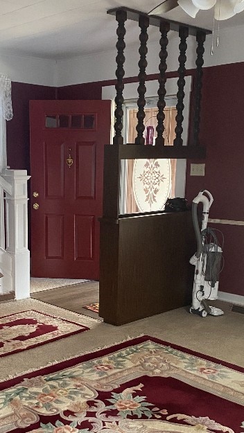 foyer featuring ceiling fan