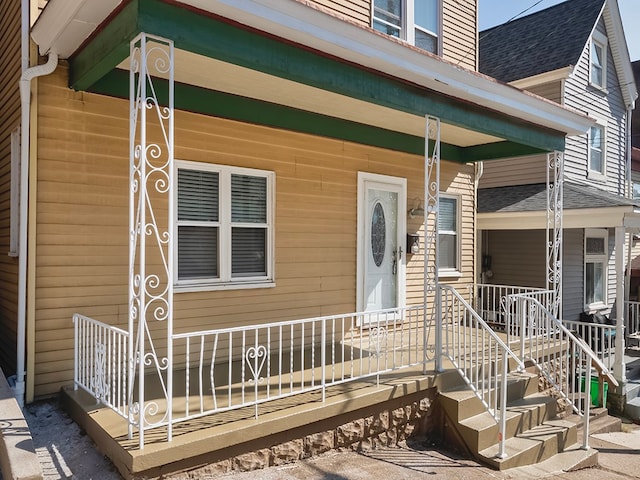 entrance to property with covered porch