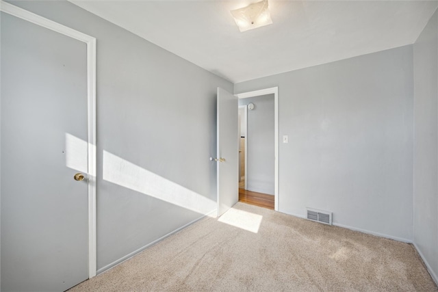 unfurnished bedroom featuring carpet flooring