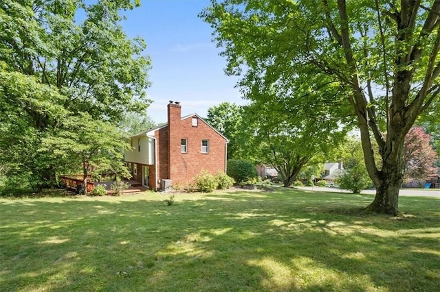 view of yard featuring a deck