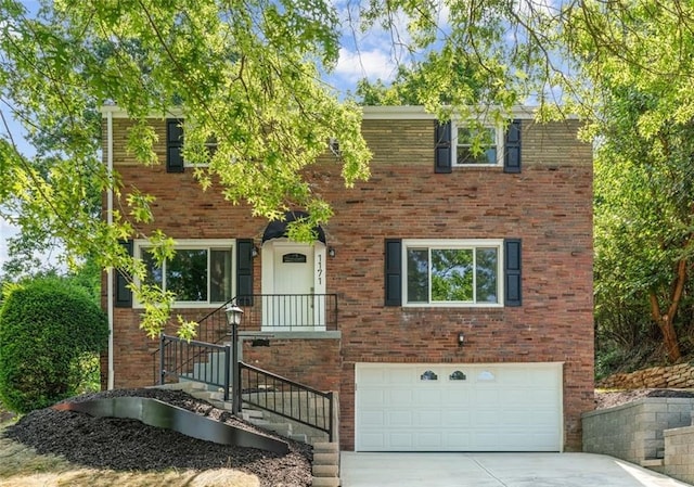 view of front of property with a garage