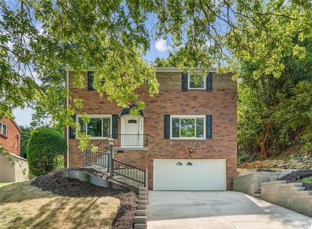 view of front of property with a garage