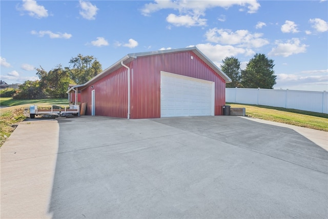 garage with a yard