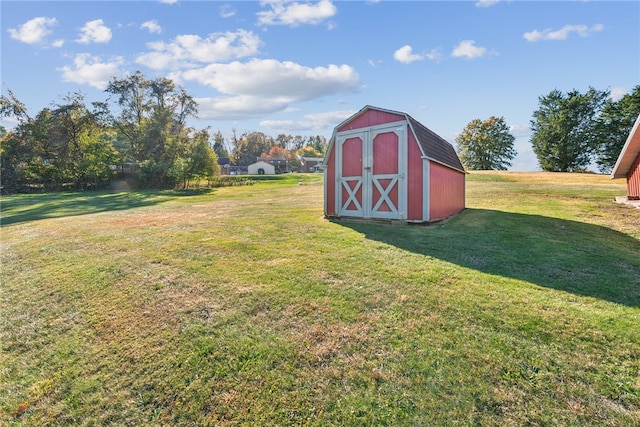 view of outdoor structure with a lawn