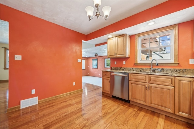 kitchen with light hardwood / wood-style flooring, dishwasher, and a wealth of natural light