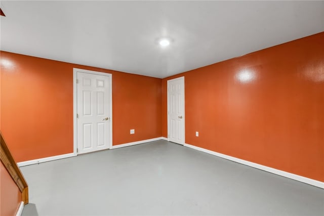 interior space with a closet and concrete flooring