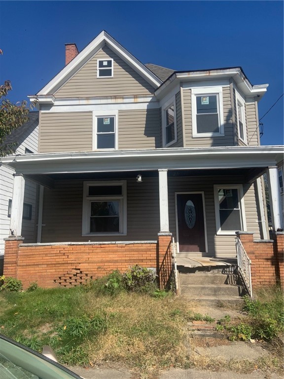 view of front of house featuring covered porch