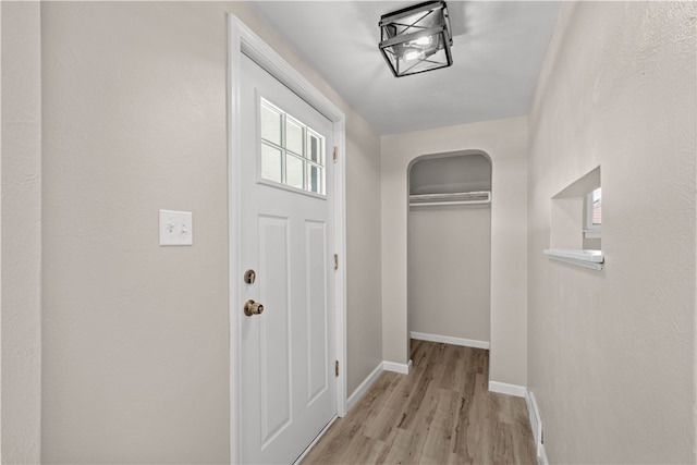 entryway with light hardwood / wood-style flooring