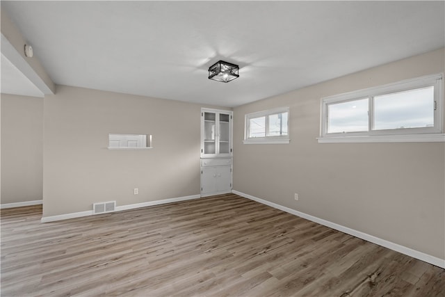 empty room featuring light wood-type flooring