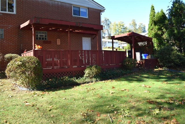 exterior space featuring a yard and a deck