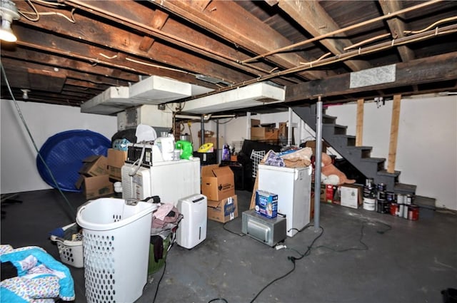 unfinished basement featuring stairs