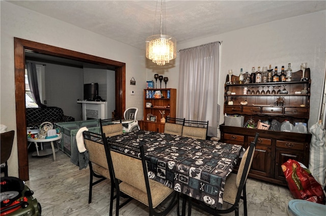 dining room with a chandelier