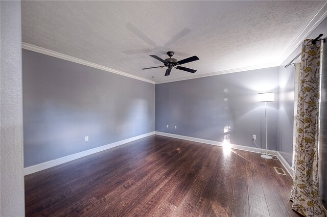 spare room featuring ornamental molding, a textured ceiling, dark wood-type flooring, and ceiling fan