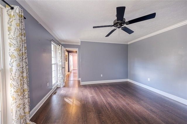 spare room with crown molding, a textured ceiling, dark wood-type flooring, and ceiling fan