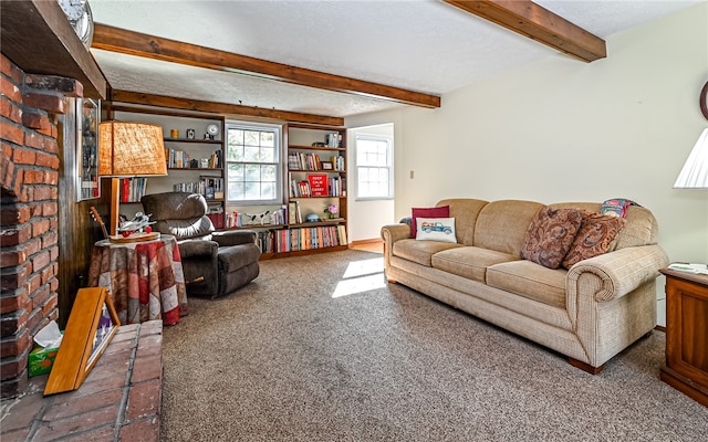 living room with beam ceiling, a fireplace, a textured ceiling, and dark carpet