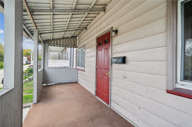 view of patio featuring a porch