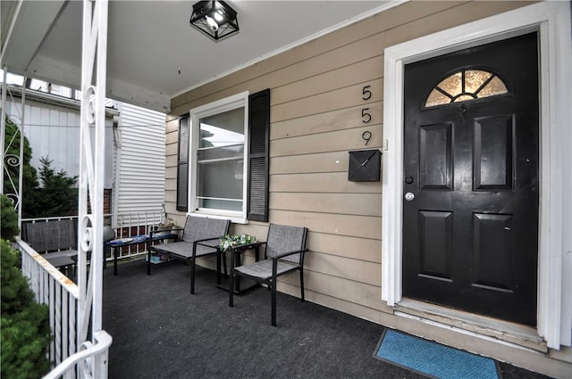 entrance to property with a porch