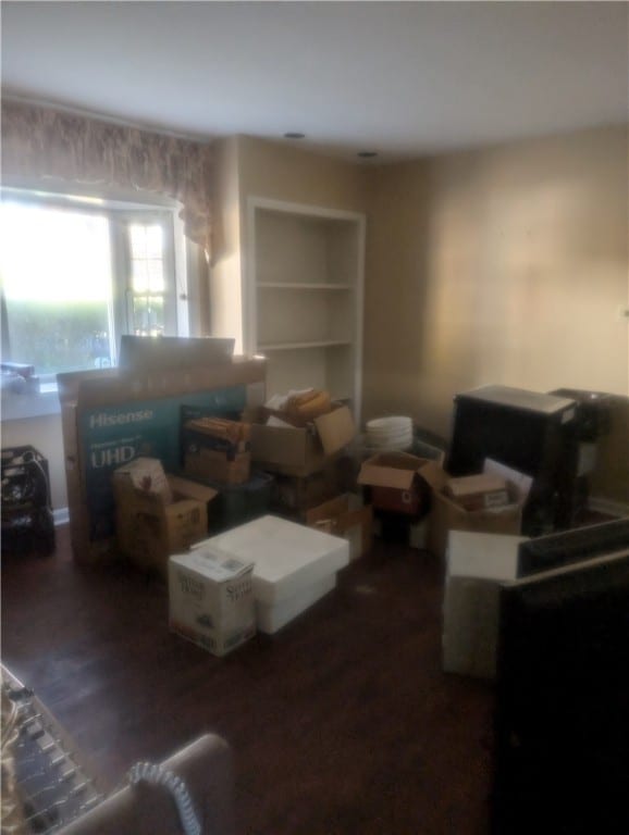 living room with dark wood-type flooring