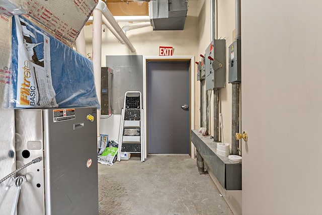 utility room with heating unit