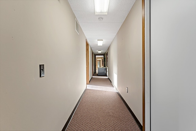 hallway featuring carpet flooring