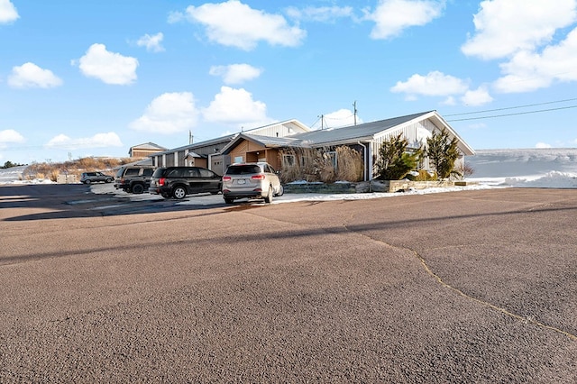 view of front of property with a carport