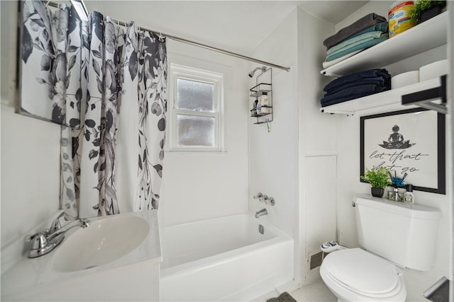 bathroom with a sink, shower / bathtub combination with curtain, and toilet