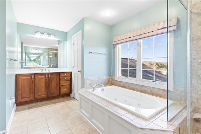 bathroom with vanity, tile patterned floors, and independent shower and bath