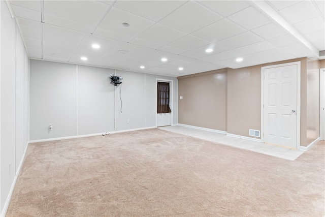 unfurnished room with light colored carpet