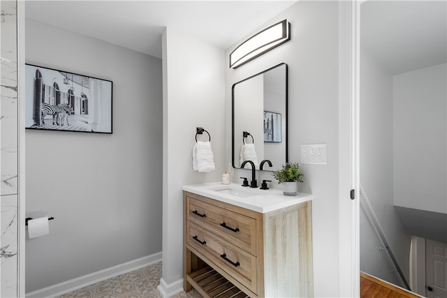 bathroom with vanity and hardwood / wood-style flooring