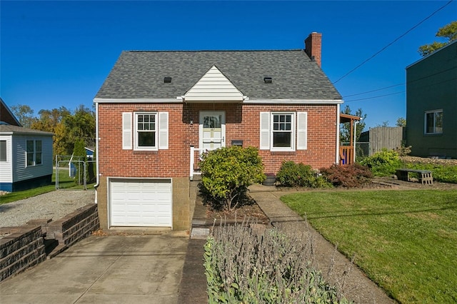 bungalow-style house with a front yard and a garage