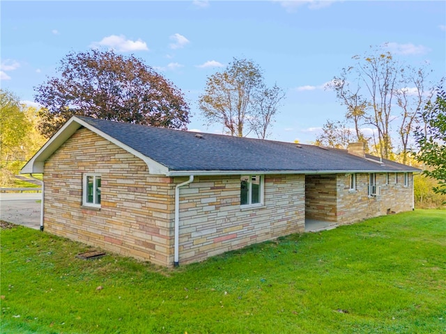 view of property exterior featuring a yard