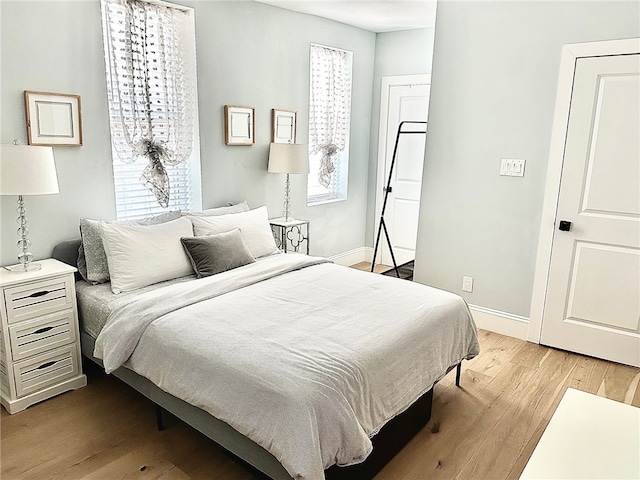 bedroom featuring light hardwood / wood-style flooring