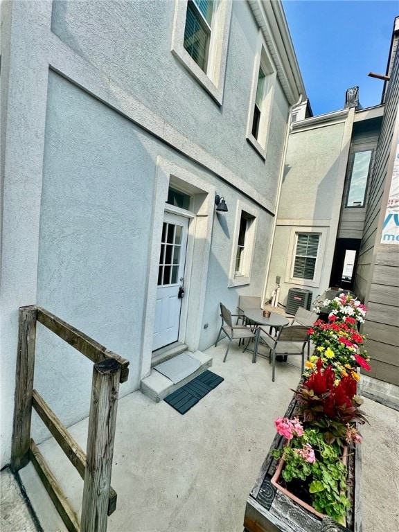 view of patio / terrace with central AC unit