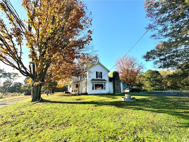 exterior space with a yard